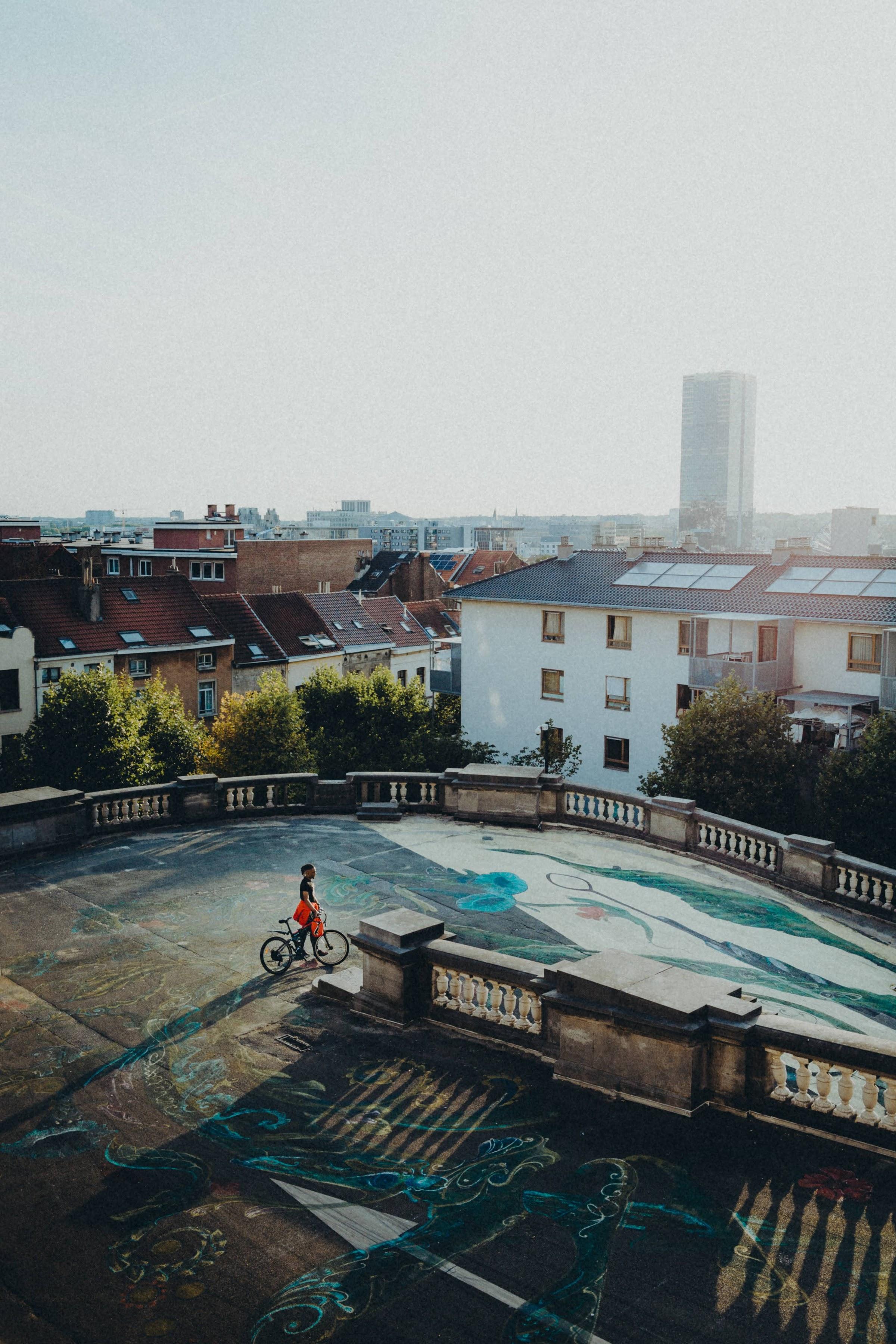 man with bike in Brussels